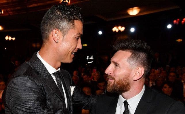 Cristiano Ronaldo y Leo Messi | EFE