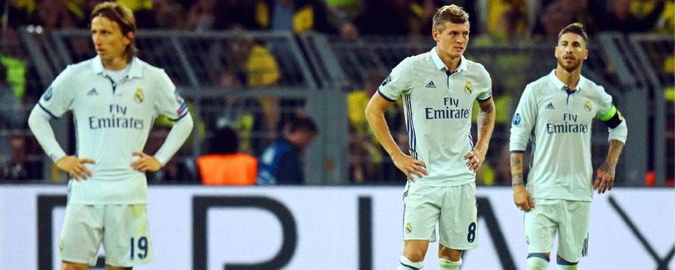 Modric, Kroos y Sergio Ramos se lamentan tras el empate entre el Madrid y el Borussia en Dortmund | EFE