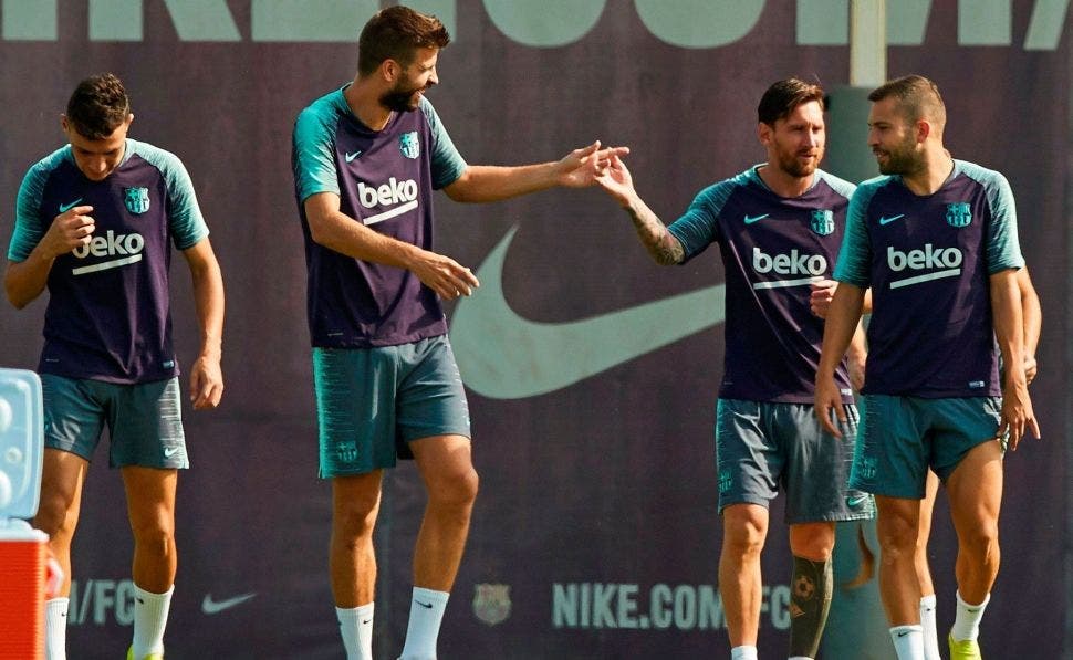Gerard Piqué y Leo Messi en un entrenamiento | EFE