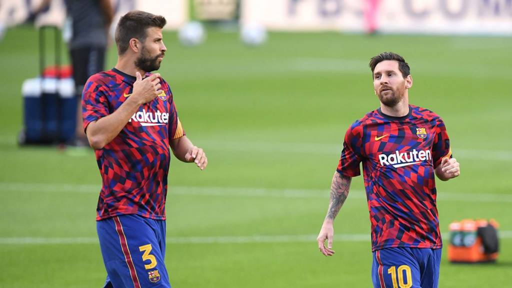 Gerard Piqué y Leo Messi