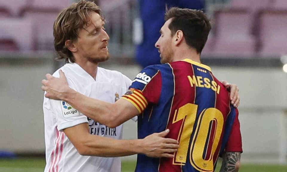 Luka Modric y Leo Messi