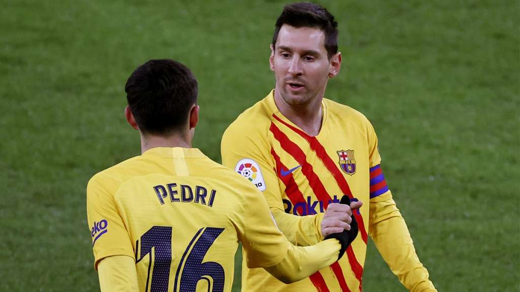 Pedri y Messi