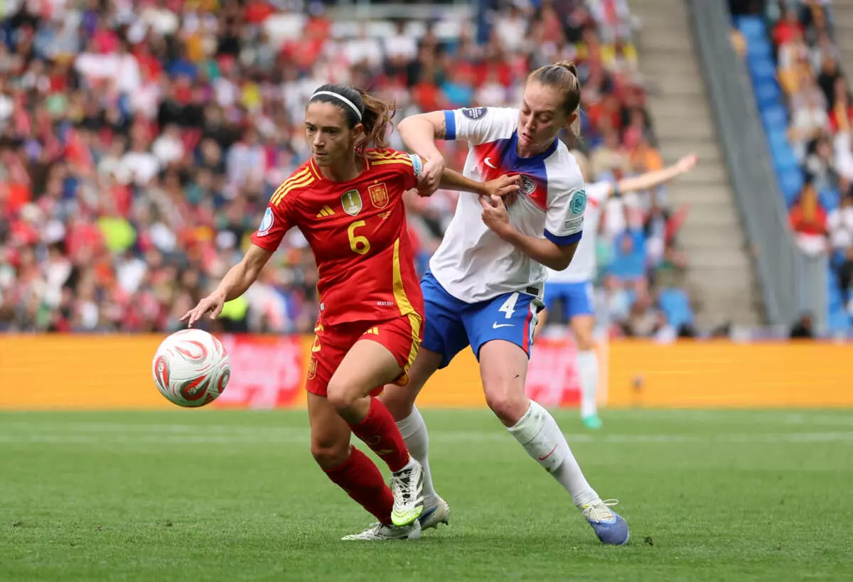 BASEL, SWITZERLAND - JULY 27: Aitana Bonmati of Spain is challenged by Keira Walsh of England during the UEFA Women's EURO 2025 Final match between England and Spain at St. Jakob-Park on July 27, 2025 in Basel, Switzerland. (Photo by Florencia Tan Jun - UEFA/UEFA via Getty Images)
