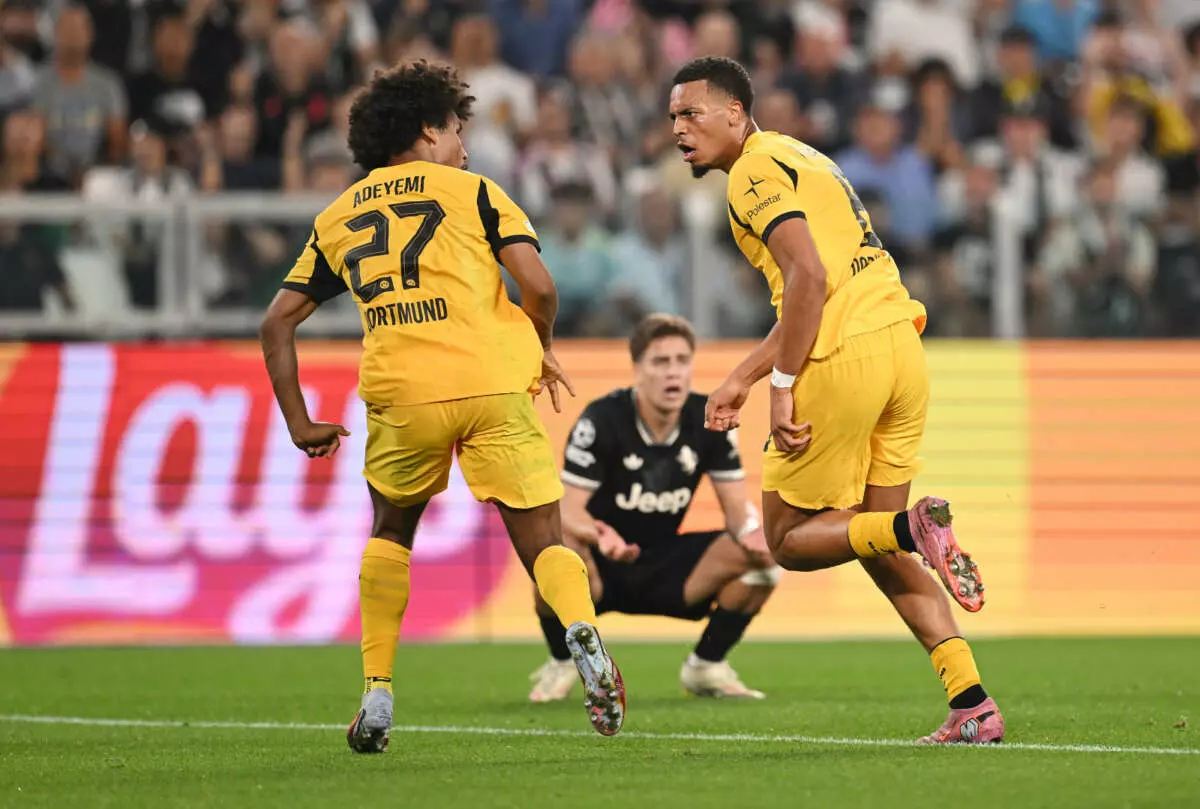 TURIN, ITALY - SEPTEMBER 16: Felix Nmecha of Borussia Dortmund celebrates scoring his team's second goal with teammate Karim Adeyemi during the UEFA Champions League 2025/26 League Phase MD1 match between Juventus and Borussia Dortmund at Juventus Stadium on September 16, 2025 in Turin, Italy. (Photo by Tullio Puglia - UEFA/UEFA via Getty Images)