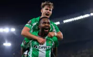 SEVILLE, SPAIN - SEPTEMBER 24: Cedric Bakambu of Real Betis celebrates after scoring his team's first goal during the UEFA Europa League 2025/26 League Phase MD1 match between Real Betis Balompie and Nottingham Forest FC at La Cartuja de Sevilla on September 24, 2025 in Seville, Spain. (Photo by Fran Santiago - UEFA/UEFA via Getty Images)