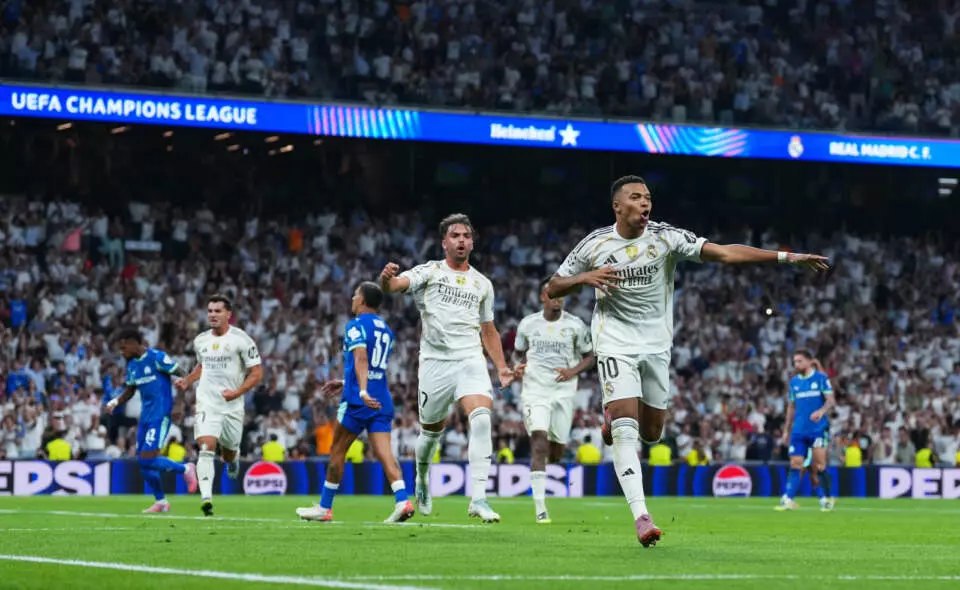 MADRID, SPAIN - SEPTEMBER 16: Kylian Mbappe of Real Madrid celebrates scoring his team's second goal from the penalty spot during the UEFA Champions League 2025/26 League Phase MD1 match between Real Madrid C.F. and Olympique de Marseille at Estadio Santiago Bernabeu on September 16, 2025 in Madrid, Spain. (Photo by Aitor Alcalde - UEFA/UEFA via Getty Images)