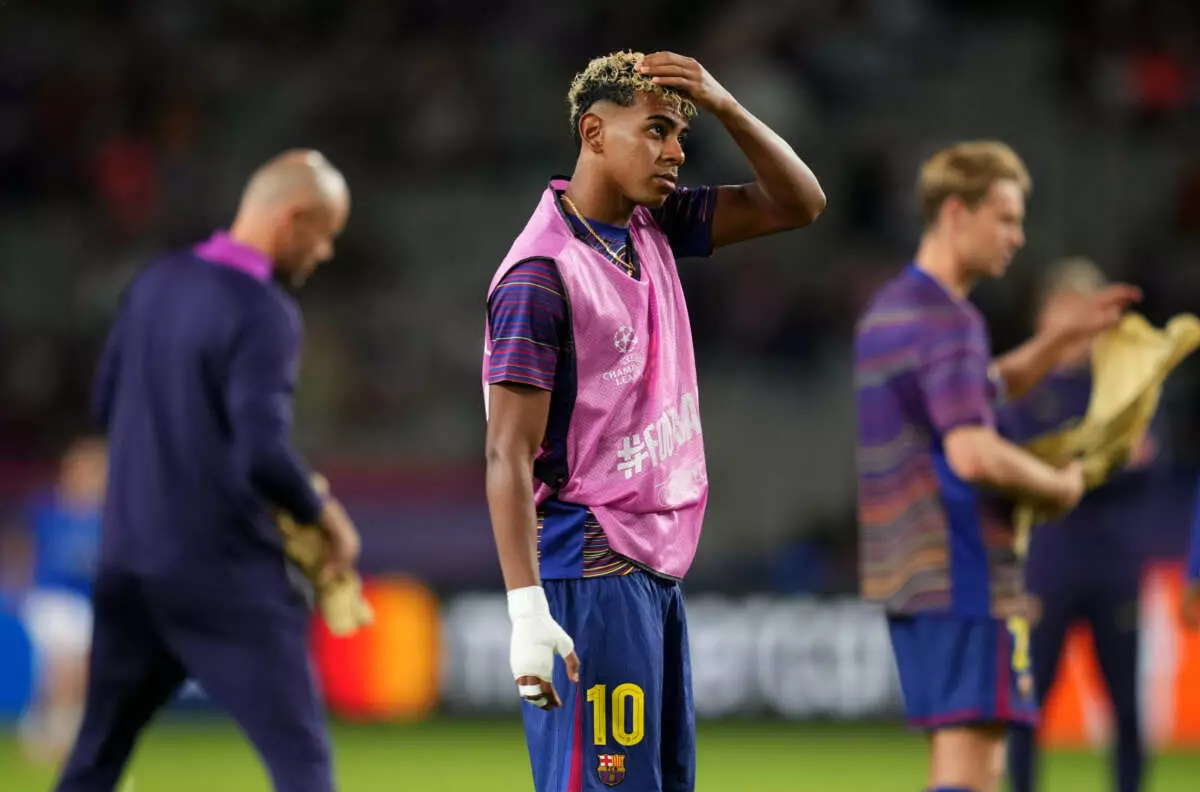 BARCELONA, SPAIN - OCTOBER 01: Lamine Yamal of FC Barcelona looks on during the warm up prior to the UEFA Champions League 2025/26 League Phase MD2 match between FC Barcelona and Paris Saint-Germain at Estadi Olimpic Lluis Companys on October 01, 2025 in Barcelona, Spain. (Photo by Alex Caparros - UEFA/UEFA via Getty Images)