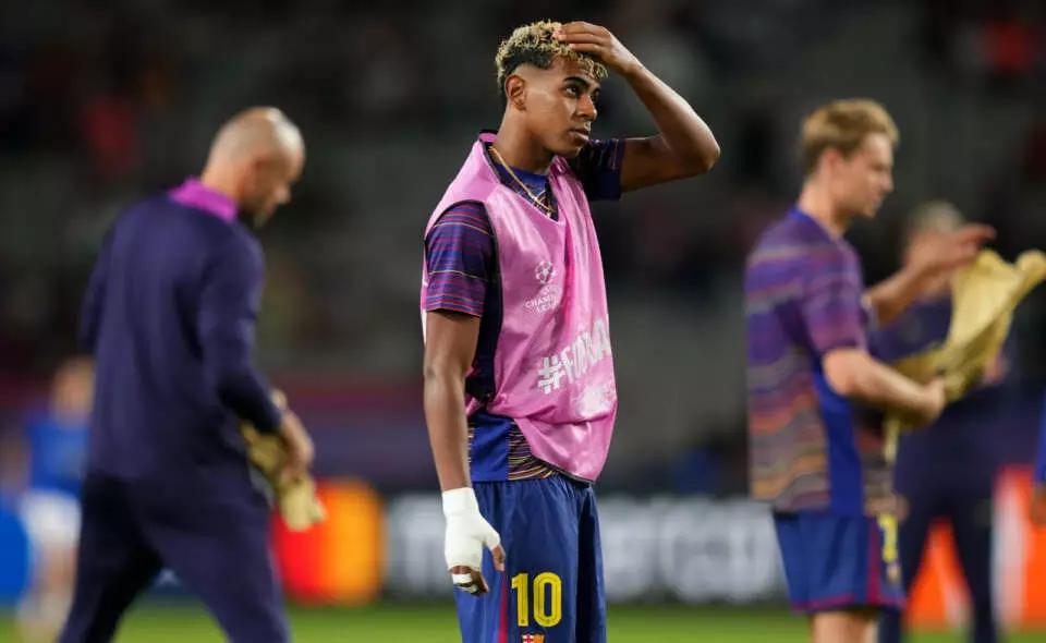 BARCELONA, SPAIN - OCTOBER 01: Lamine Yamal of FC Barcelona looks on during the warm up prior to the UEFA Champions League 2025/26 League Phase MD2 match between FC Barcelona and Paris Saint-Germain at Estadi Olimpic Lluis Companys on October 01, 2025 in Barcelona, Spain. (Photo by Alex Caparros - UEFA/UEFA via Getty Images)
