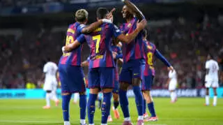 BARCELONA, SPAIN - OCTOBER 01: Ferran Torres of FC Barcelona celebrates with teammates after scoring his team's first goal during the UEFA Champions League 2025/26 League Phase MD2 match between FC Barcelona and Paris Saint-Germain at Estadi Olimpic Lluis Companys on October 01, 2025 in Barcelona, Spain. (Photo by Alex Caparros - UEFA/UEFA via Getty Images)