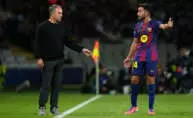 BARCELONA, SPAIN - OCTOBER 01: Hansi Flick, Head Coach of FC Barcelona, interacts with Eric Garcia of FC Barcelona during the UEFA Champions League 2025/26 League Phase MD2 match between FC Barcelona and Paris Saint-Germain at Estadi Olimpic Lluis Companys on October 01, 2025 in Barcelona, Spain. (Photo by Alex Caparros - UEFA/UEFA via Getty Images)