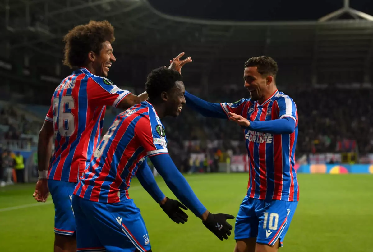 LUBLIN, POLAND - OCTOBER 02: Eddie Nketiah of Crystal Palace celebrates scoring his team's second goal with teammate Chris Richards and Yeremy Pino during the UEFA Conference League 2025/26 League Phase MD1 match between FC Dynamo Kyiv and Crystal Palace FC at Arena Lublin on October 02, 2025 in Lublin, Poland. (Photo by Adam Nurkiewicz - UEFA/UEFA via Getty Images)