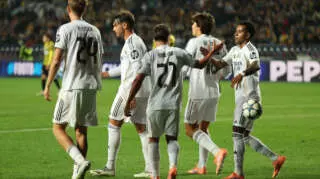 ALMATY, KAZAKHSTAN - SEPTEMBER 30: Brahim Diaz of Real Madrid celebrates scoring his team's fifth goal with teammates during the UEFA Champions League 2025/26 League Phase MD2 match between FC Kairat Almaty and Real Madrid C.F. at Almaty Ortalyk Stadion on September 30, 2025 in Almaty, Kazakhstan. (Photo by Neville Hopwood - UEFA/UEFA via Getty Images)