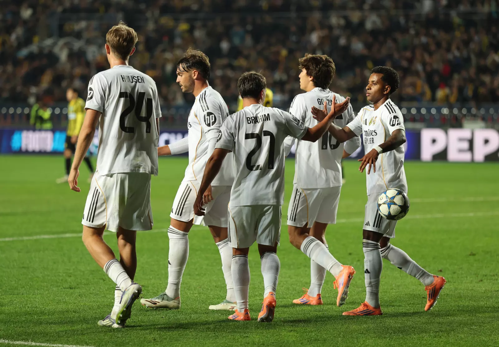 ALMATY, KAZAKHSTAN - SEPTEMBER 30: Brahim Diaz of Real Madrid celebrates scoring his team's fifth goal with teammates during the UEFA Champions League 2025/26 League Phase MD2 match between FC Kairat Almaty and Real Madrid C.F. at Almaty Ortalyk Stadion on September 30, 2025 in Almaty, Kazakhstan. (Photo by Neville Hopwood - UEFA/UEFA via Getty Images)