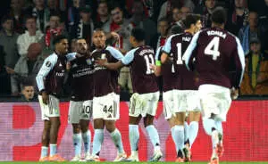 ROTTERDAM, NETHERLANDS - OCTOBER 02: Emiliano Buendia of Aston Villa celebrates scoring his team's first goal with teammates Ian Maatsen and Boubacar Kamara during the UEFA Europa League 2025/26 League Phase MD2 match between Feyenoord and Aston Villa FC at De Kuip on October 02, 2025 in Rotterdam, Netherlands. (Photo by Lars Baron - UEFA/UEFA via Getty Images)