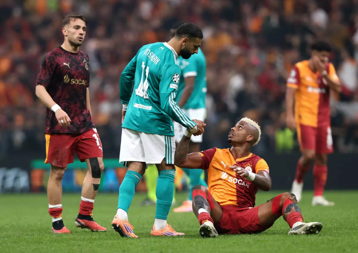 ISTANBUL, TURKEY - SEPTEMBER 30: Mohamed Salah of Liverpool interacts with Mario Lemina of Galatasaray A.S. following the UEFA Champions League 2025/26 League Phase MD2 match between Galatasaray A.S. and Liverpool FC at Ali Sami Yen Spor Kompleksi on September 30, 2025 in Istanbul, Turkey. (Photo by Ahmad Mora - UEFA/UEFA via Getty Images)