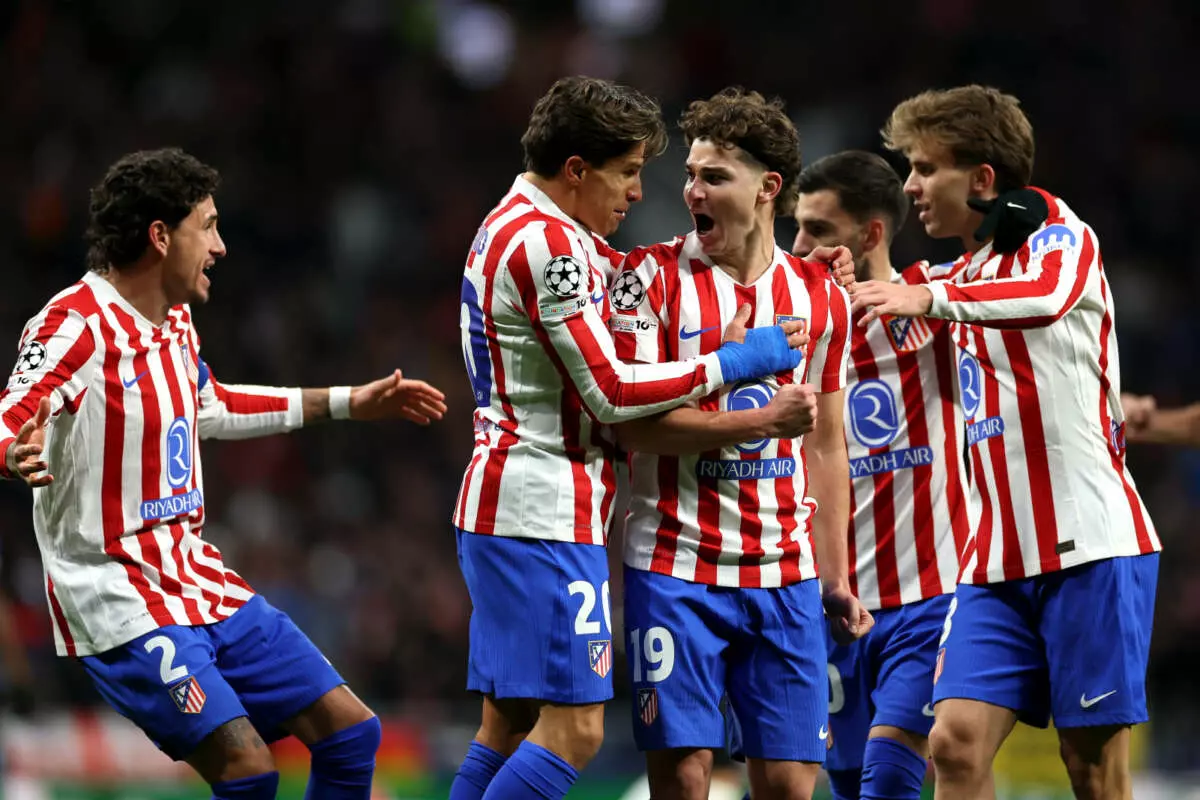 MADRID, SPAIN - NOVEMBER 26: Julian Alvarez of Atletico de Madrid celebrates scoring his team's first goal with teammates during the UEFA Champions League 2025/26 League Phase MD5 match between Atletico de Madrid and FC Internazionale Milano at Estadio Metropolitano on November 26, 2025 in Madrid, Spain. (Photo by Florencia Tan Jun - UEFA/UEFA via Getty Images)