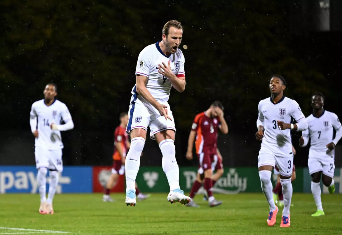 RIGA, LATVIA - OCTOBER 14: Harry Kane of England celebrates scoring his team's third goal from the penalty spot during the FIFA World Cup 2026 qualifier match between Latvia and England at Daugava Stadium on October 14, 2025 in Riga, Latvia. (Photo by Tullio Puglia - UEFA/UEFA via Getty Images)
