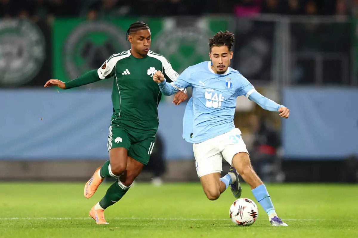 MALMO, SWEDEN - NOVEMBER 06: Adrian Skogmar of Malmo FF runs with the ball whilst under pressure from Tete of Panathinaikos during the UEFA Europa League 2025/26 League Phase MD4 match between Malmo FF and Panathinaikos FC at Malmo New Stadium on November 06, 2025 in Malmo, Sweden. (Photo by Joern Pollex - UEFA/UEFA via Getty Images)