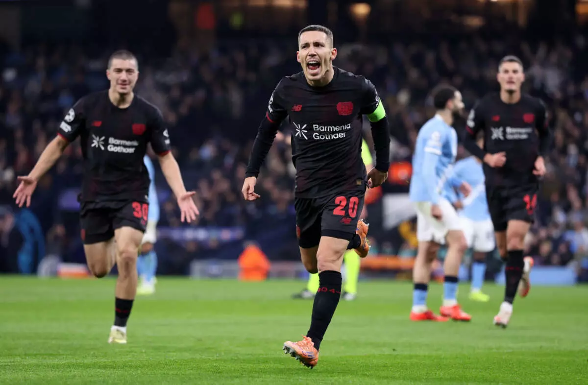 MANCHESTER, ENGLAND - NOVEMBER 25: Alex Grimaldo of Bayer Leverkusen celebrates scoring a goal which is later disallowed following a VAR review during the UEFA Champions League 2025/26 League Phase MD5 match between Manchester City and Bayer 04 Leverkusen at City of Manchester Stadium on November 25, 2025 in Manchester, England. (Photo by Alex Livesey - UEFA/UEFA via Getty Images)