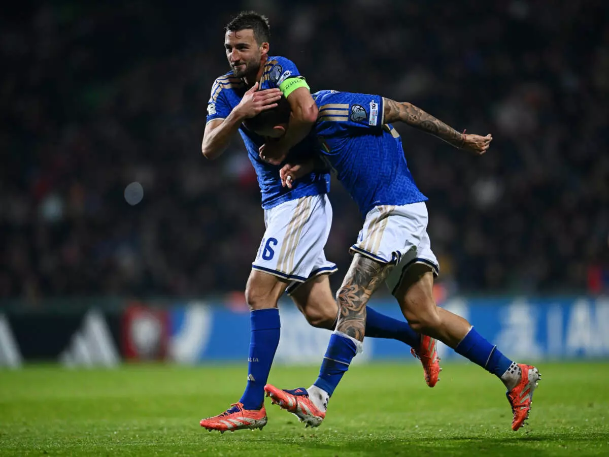 CHISINAU, MOLDOVA - NOVEMBER 13: Gianluca Mancini of Italy celebrates scoring his team's first goal with teammate Bryan Cristante during the FIFA World Cup 2026 qualifier match between Moldova and Italy at Stadionul Zimbru on November 13, 2025 in Chisinau, Moldova. (Photo by Mattia Ozbot - UEFA/UEFA via Getty Images)